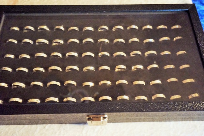 72- 925 Stamped Eternity Bands In Glass Top Case 