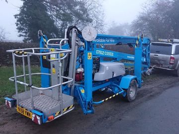 Daily Equipment Rental: Trailer Mounted Towable Cherry Picker Boom Lift Genie Access