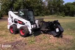 Renting out equipment (w/ operator): Stump grinder attachment for a tractor