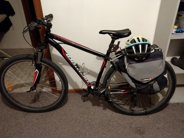 Daily Rate: second hand mountain bike with saddle bags, bike chain and helmet