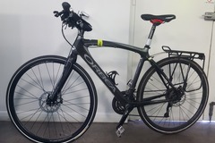 Weekly Rate: Excellent carbon fibre hybrid / touring bike with panniers