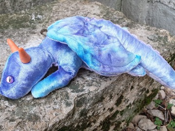  Selger med angrerett (kommersiell selger): Shoulder-Dragon Violet-Blue