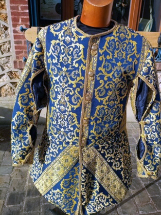Jerkin with punctured sleeves, blue and gold