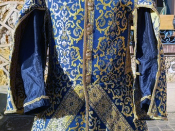 Sælge: Jerkin with punctured sleeves, blue and gold