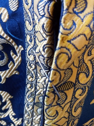 Jerkin with punctured sleeves, blue and gold