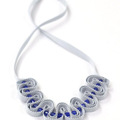 : Pale grey ribbon necklace with blue beads
