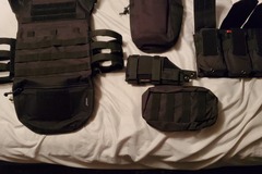 Selling: Black molle vest with loads of attachments 