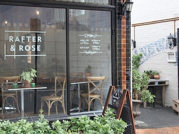 Book a table: Delightful indoor café plus open shady laneway with flowers