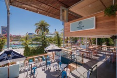 Free | Book a table: Take in the views, and work in this endless summer vibe!