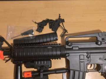 Selling: M83 rifle with attachments and spring gun with face mask and more