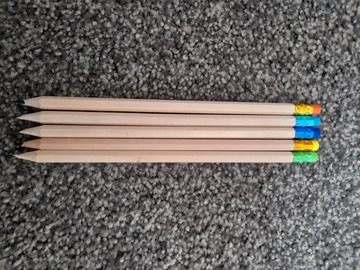 Selling with online payment: Blue, cyan, green, orange and yellow pencils 