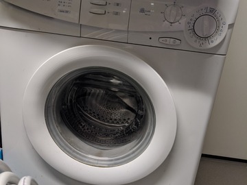 Faire offre: Machine à laver Candy à réparer ou pour pièces