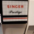 À vendre: Machine à coudre SINGER PRESTIGE