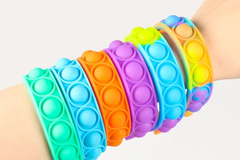 Comprar ahora: 100 Pieces Push Pop Bubble Wristband Fidget Toys