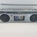 Faire offre: Radio Sanyo avec cassette intégrée