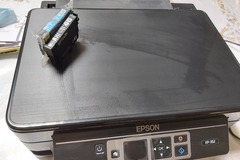 Faire offre: Imprimante epson à réparer avec 4  nouvelles cartouches 