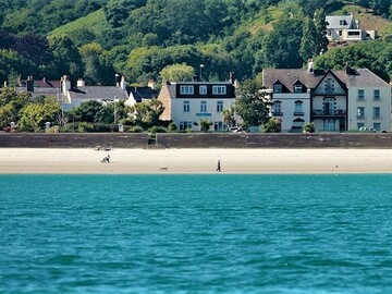 Accommodation Per Night: Steps from the sand of St Aubin's Bay