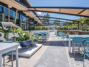 Book a meeting | $: Rose Garden | Perfect outdoor meeting space to treat your team