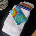 Selling: Pride Socks unworn rainbow thigh high tube socks- "Fearless"