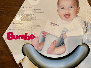 Selling with online payment: New in box Bumbo floor seat