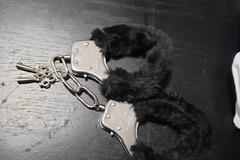 Selling: Black furry handcuffs