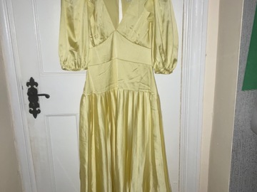 For Rent: Yellow pleated midi dress