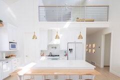 Hourly Rental: Modern Kitchen and Great Room with Gold and White Coloring