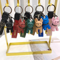 Comprar ahora: 50pcs ins hot stamping dog dog dog car keychain female pendant