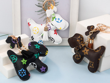 Buy Now: 45pcs cartoon cotton-filled puppy keychain flower tassel pendant