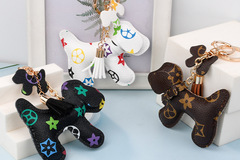 Comprar ahora: 45pcs cartoon cotton-filled puppy keychain flower tassel pendant