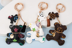 Comprar ahora: 50pcs cotton-filled cartoon flower bear tassel keychain