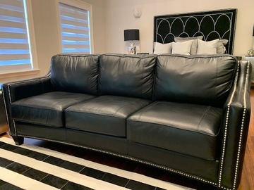 Individual Sellers: Black Leather Three-Seat Sofa