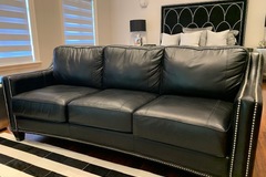 Selling: Black Leather Three-Seat Sofa
