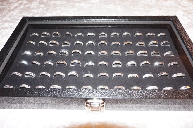 72- 925 Stamped Eternity Bands In Glass Top Case 