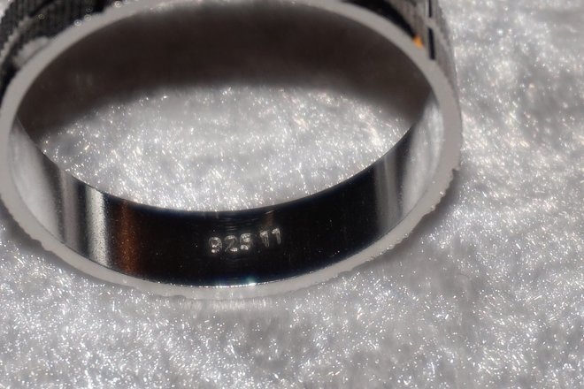 72- 925 Stamped Eternity Bands In Glass Top Case 