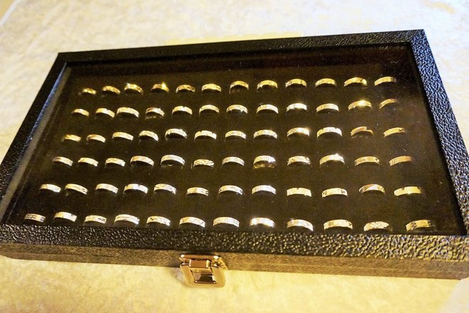 72- 925 Stamped Eternity Bands In Glass Top Case 