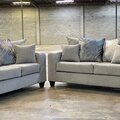 Selling with online payment: Light grey sofa and loveseat with decorative pillows - new