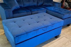 Selling with online payment: Blue velvet tufted reversible sectional and ottoman - new