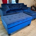 Selling with online payment: Blue velvet tufted reversible sectional and ottoman - new