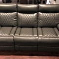 Selling with online payment:  Gray leather reclining sofa and reclining loveseat - new