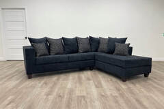 Selling with online payment: Black sectional includes throw pillows - new