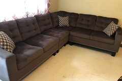 Selling with online payment: Tufted chocolate reversible sectional with nailhead trim  - new