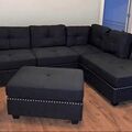 Selling with online payment: Black linen tufted sectional with ottoman - new