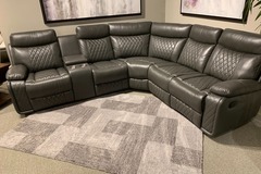 Selling with online payment: Grey leather reclining sectional with cup holders - new