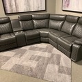 Selling with online payment: Grey leather reclining sectional with cup holders - new