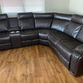 Selling with online payment: Brown leather reclining sectional with cup holders - new