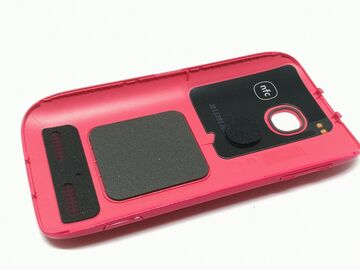 Selling with online payment: Nokia 603 battery cover, original and new, in magenta