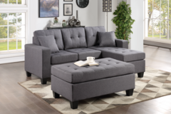 Selling with online payment: Grey linen tufted reversible sectional and ottoman - new