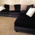 Selling with online payment: Modern style black velvet reversible sectional - new