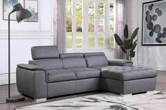 Selling with online payment: Tufted grey sectional with pull out bed & hidden storage - new